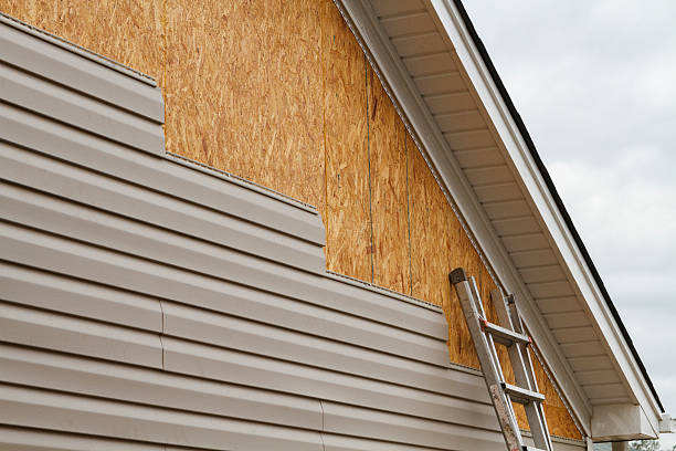 Professional Siding Contractor technician working in Reading, OH
